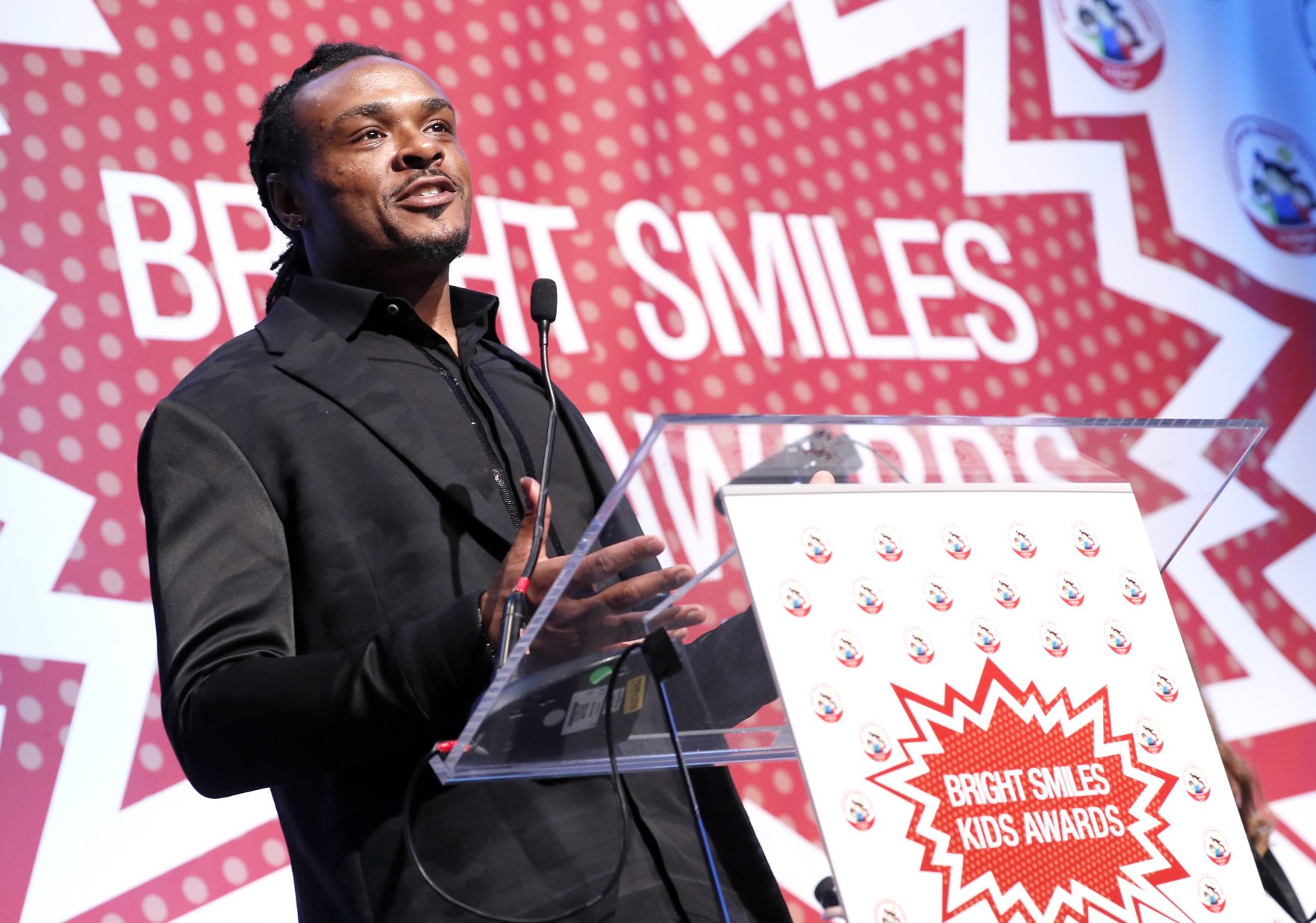 Brandon Carr, veteran cornerback for the NFL's Baltimore Ravens, addresses hundreds of Baltimore elementary school students at the first ever Bright Smiles Kids Awards hosted by Colgate Bright Smiles, Bright Futures (BSBF) at the Marriott Waterfront Hotel on Friday, February 15, 2019 in Baltimore. Bright Smiles, Bright Futures is Colgate-Palmolive Company's global oral health initiative for children ages 1-12. Since 1991, BSBF has reached more than one billion children in 80 countries with free dental screenings, oral heath education and treatment referrals. (Paul Morigi/AP Images for Colgate-Palmolive Company)
